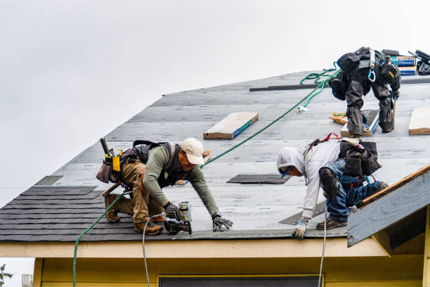Professional Roof Replacement technician working in Kensington, CT